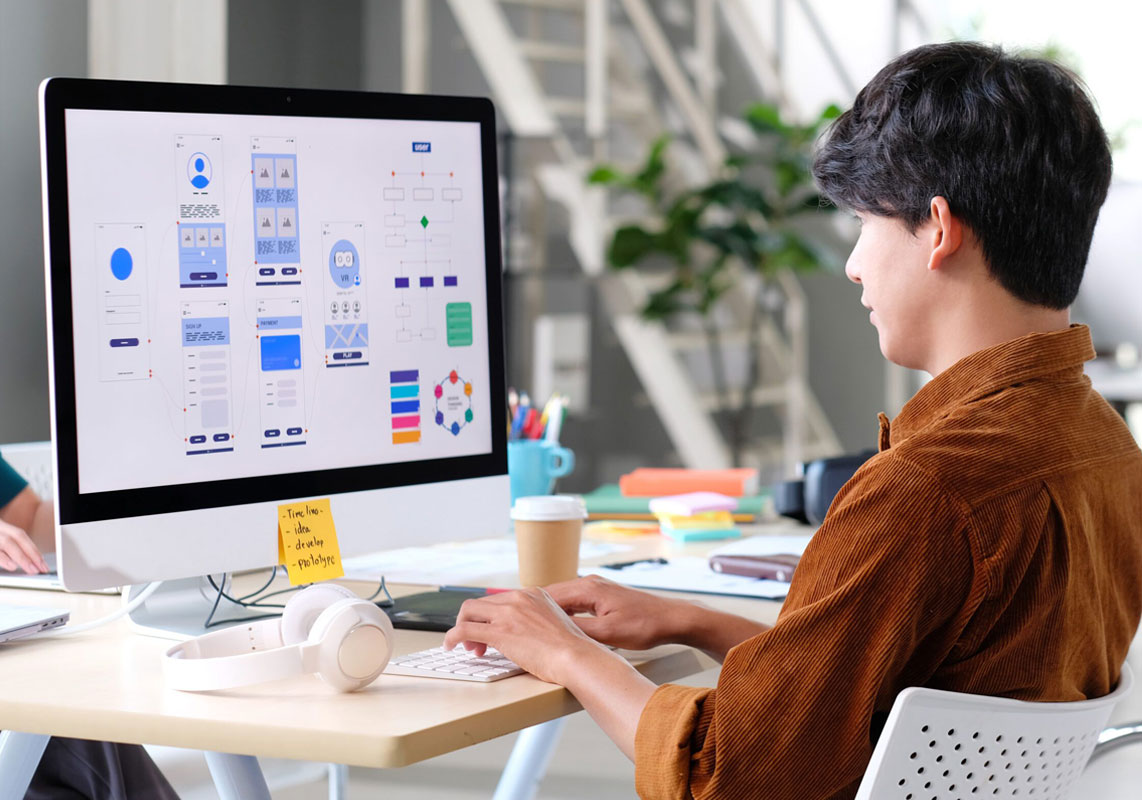 Custom web design mockup showcasing responsive layouts across desktop, tablet, and mobile devices with dynamic CSS and JavaScript effects.
